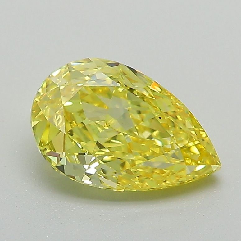 Loose Diamond - PEAR 1.57ct Fancy Vivid Yellow VS1: Loose Diamond - PEAR 1.57ct Fancy Vivid Yellow VS1 Source: This is a real non-mined Diamond that has been grown in a lab Shape: PEAR Carats: 1.57 Color: Fancy Vivid Yellow Certification: IGI Video: