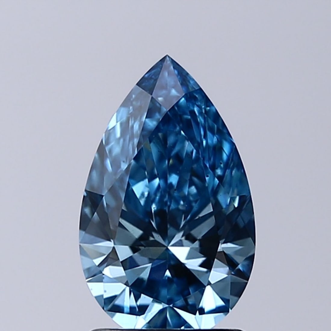 Loose Diamond - PEAR 1.32ct Fancy Vivid Blue VS2: Loose Diamond - PEAR 1.32ct Fancy Vivid Blue VS2 Source: This is a real non-mined Diamond that has been grown in a lab Shape: PEAR Carats: 1.32 Color: Fancy Vivid Blue Certification: IGI Video: