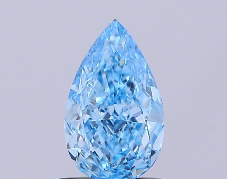 Loose Diamond - PEAR 0.99ct Fancy Vivid Blue VS1: Loose Diamond - PEAR 0.99ct Fancy Vivid Blue VS1 Source: This is a real non-mined Diamond that has been grown in a lab Shape: PEAR Carats: 0.99 Color: Fancy Vivid Blue Certification: IGI Video: