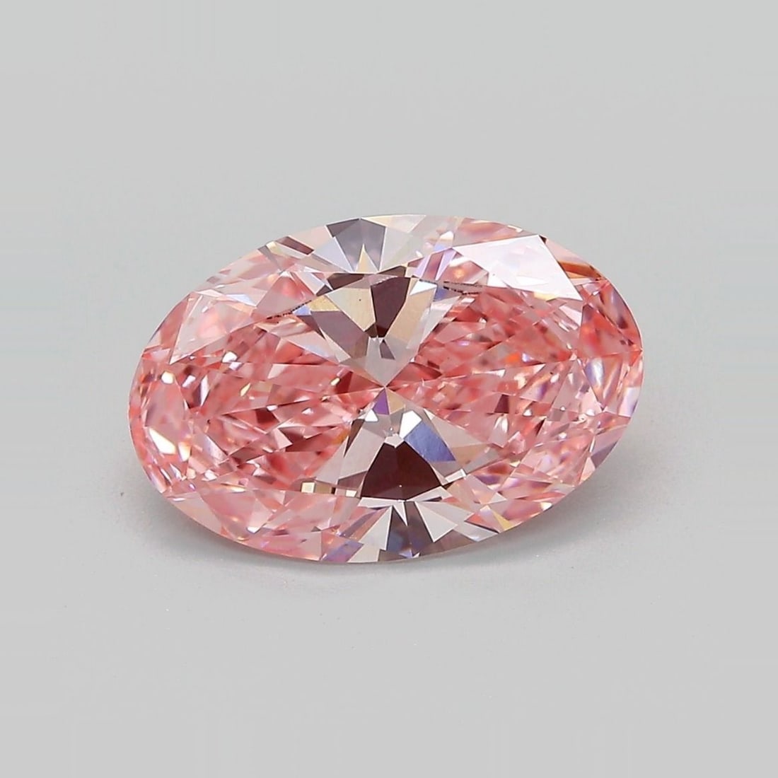 Loose Diamond - OVAL 3.24ct Fancy Vivid Pink VS1: Loose Diamond - OVAL 3.24ct Fancy Vivid Pink VS1 Source: This is a real non-mined Diamond that has been grown in a lab Shape: OVAL Carats: 3.24 Color: Fancy Vivid Pink Certification: IGI Video: