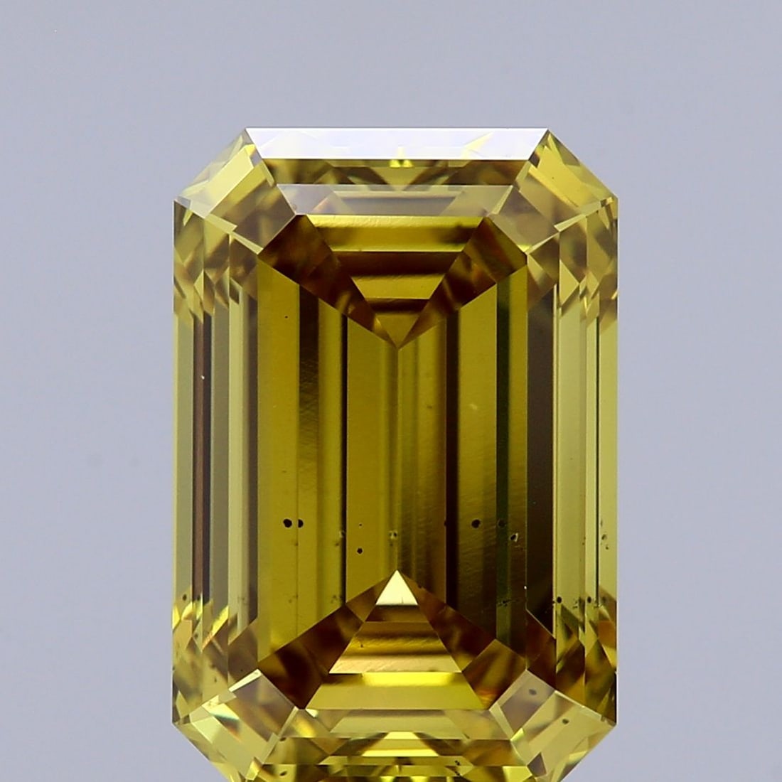 Loose Diamond - EMERALD 5.08ct Fancy Intense Greenish Yellow SI1: Loose Diamond - EMERALD 5.08ct Fancy Intense Greenish Yellow SI1 Source: This is a real non-mined Diamond that has been grown in a lab Shape: EMERALD Carats: 5.08 Color: Fancy Intense Greenish Yellow