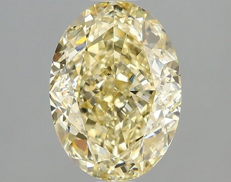 Loose Diamond - OVAL 2.1ct Fancy Intense Yellow VS2: Loose Diamond - OVAL 2.1ct Fancy Intense Yellow VS2 Source: This is a real non-mined Diamond that has been grown in a lab Shape: OVAL Carats: 2.1 Color: Fancy Intense Yellow Certification: IGI Video: