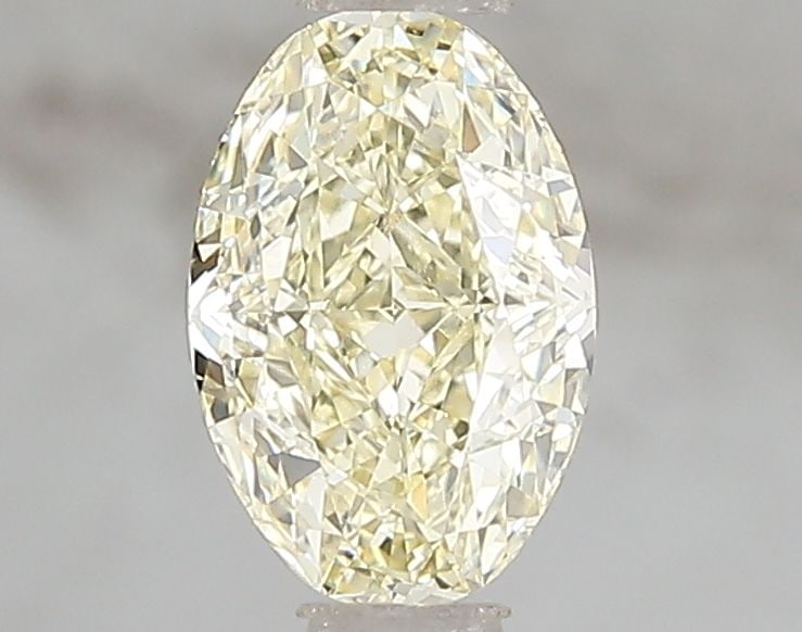 Loose Diamond - OVAL 1.03ct Fancy Yellow VVS2: Loose Diamond - OVAL 1.03ct Fancy Yellow VVS2 Source: This is a real non-mined Diamond that has been grown in a lab Shape: OVAL Carats: 1.03 Color: Fancy Yellow Certification: IGI Video: