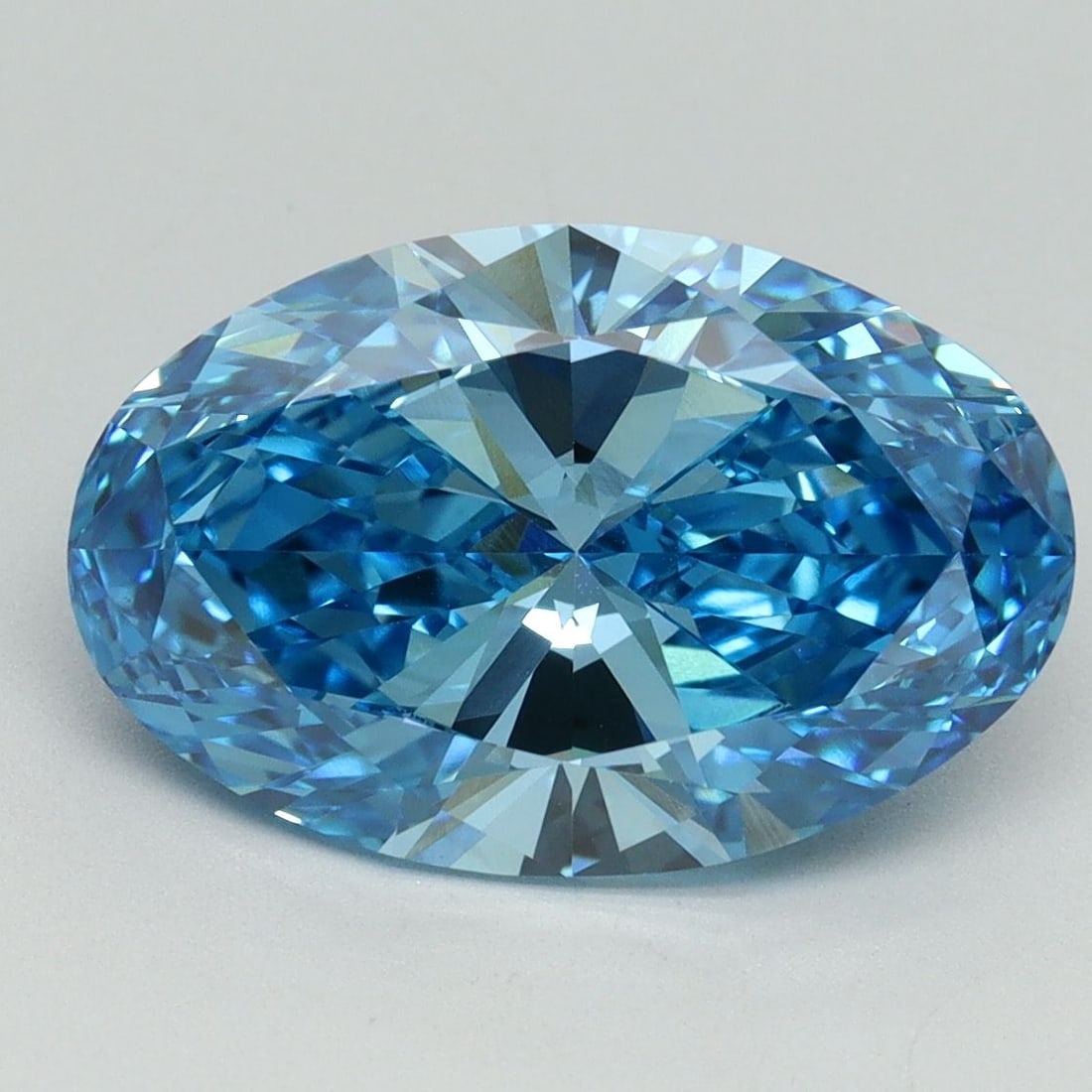 Loose Diamond - OVAL 4.06ct Fancy Vivid Blue VVS2: Loose Diamond - OVAL 4.06ct Fancy Vivid Blue VVS2 Source: This is a real non-mined Diamond that has been grown in a lab Shape: OVAL Carats: 4.06 Color: Fancy Vivid Blue Certification: IGI Video: