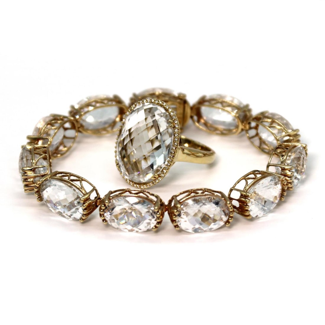 Vintage 33.25ct White Topaz Diamond 14k Yellow Gold Bracelet Ring Set: Vintage 33.25ct White Topaz Diamond 14k Yellow Gold Bracelet Ring Set This exquisite vintage bracelet and ring set is crafted from 14k yellow gold, showcasing stunning craftsmanship. The bracelet feat