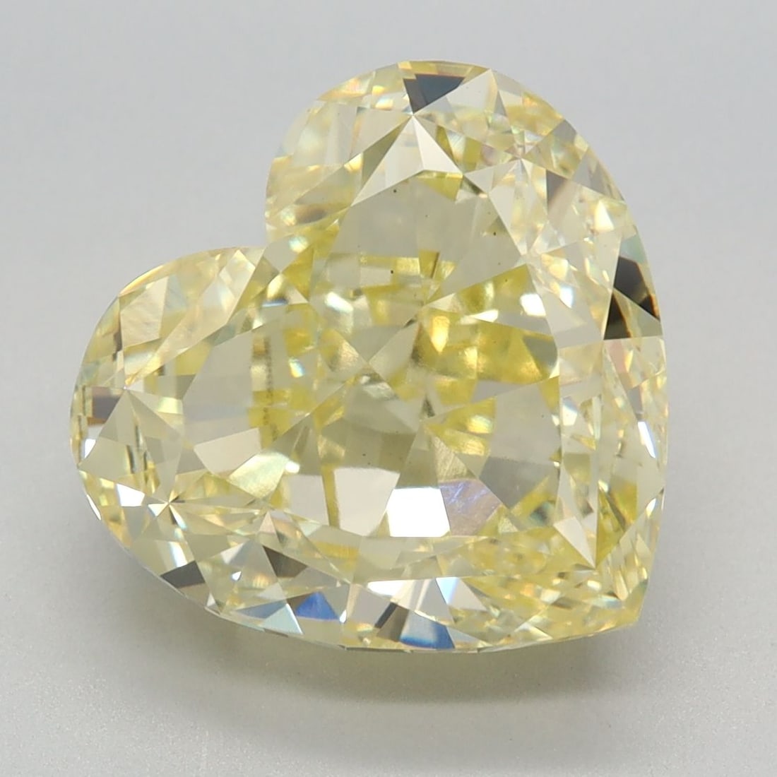 Loose Diamond - HEART 5.44ct Fancy Intense Yellow VS1: Loose Diamond - HEART 5.44ct Fancy Intense Yellow VS1 Source: This is a real non-mined Diamond that has been grown in a lab Shape: HEART Carats: 5.44 Color: Fancy Intense Yellow Certification: IGI Vid