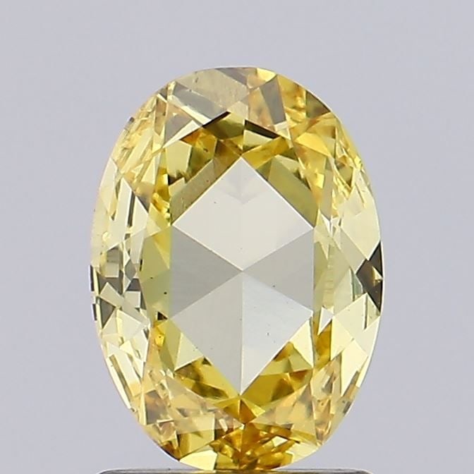 Loose Diamond - OVAL 0.93ct Fancy Vivid Brownish Yellow VS2: Loose Diamond - OVAL 0.93ct Fancy Vivid Brownish Yellow VS2 Source: This is a real non-mined Diamond that has been grown in a lab Shape: OVAL Carats: 0.93 Color: Fancy Vivid Brownish Yellow Certificat