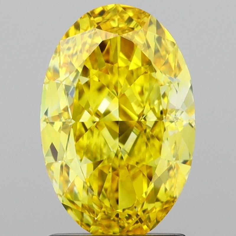Loose Diamond - OVAL 1.84ct Fancy Vivid Yellow VVS2: Loose Diamond - OVAL 1.84ct Fancy Vivid Yellow VVS2 Source: This is a real non-mined Diamond that has been grown in a lab Shape: OVAL Carats: 1.84 Color: Fancy Vivid Yellow Certification: IGI Video:
