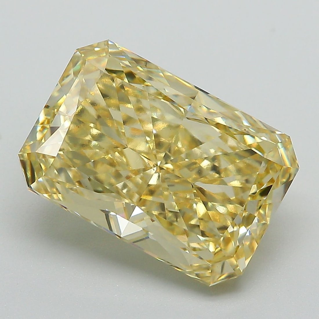 Loose Diamond - RADIANT 6.73ct Fancy Vivid Yellow VS1: Loose Diamond - RADIANT 6.73ct Fancy Vivid Yellow VS1 Source: This is a real non-mined Diamond that has been grown in a lab Shape: RADIANT Carats: 6.73 Color: Fancy Vivid Yellow Certification: IGI Vid