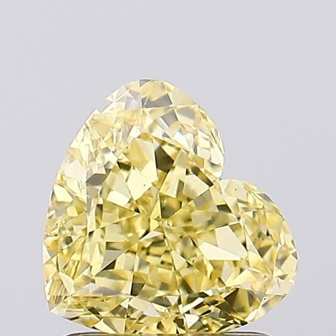 Loose Diamond - HEART 1.33ct Fancy Intense Yellow VS1: Loose Diamond - HEART 1.33ct Fancy Intense Yellow VS1 Source: This is a real non-mined Diamond that has been grown in a lab Shape: HEART Carats: 1.33 Color: Fancy Intense Yellow Certification: IGI Vid