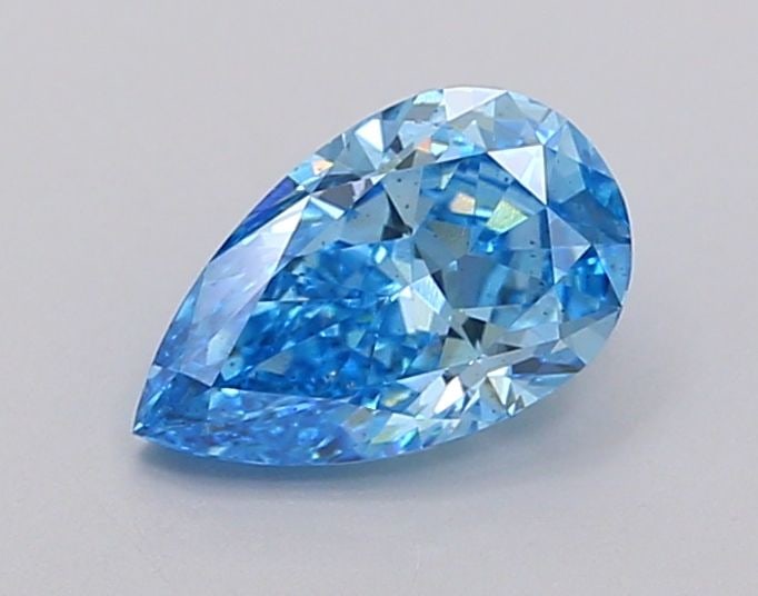 Loose Diamond - PEAR 0.93ct Fancy Vivid Blue VS2: Loose Diamond - PEAR 0.93ct Fancy Vivid Blue VS2 Source: This is a real non-mined Diamond that has been grown in a lab Shape: PEAR Carats: 0.93 Color: Fancy Vivid Blue Certification: IGI Video: