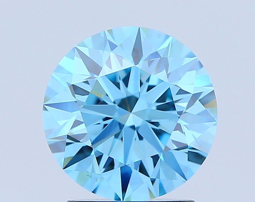 Loose Diamond - ROUND 2.0ct Fancy Vivid Blue VS1: Loose Diamond - ROUND 2.0ct Fancy Vivid Blue VS1 Source: This is a real non-mined Diamond that has been grown in a lab Shape: ROUND Carats: 2.0 Color: Fancy Vivid Blue Certification: IGI Video: