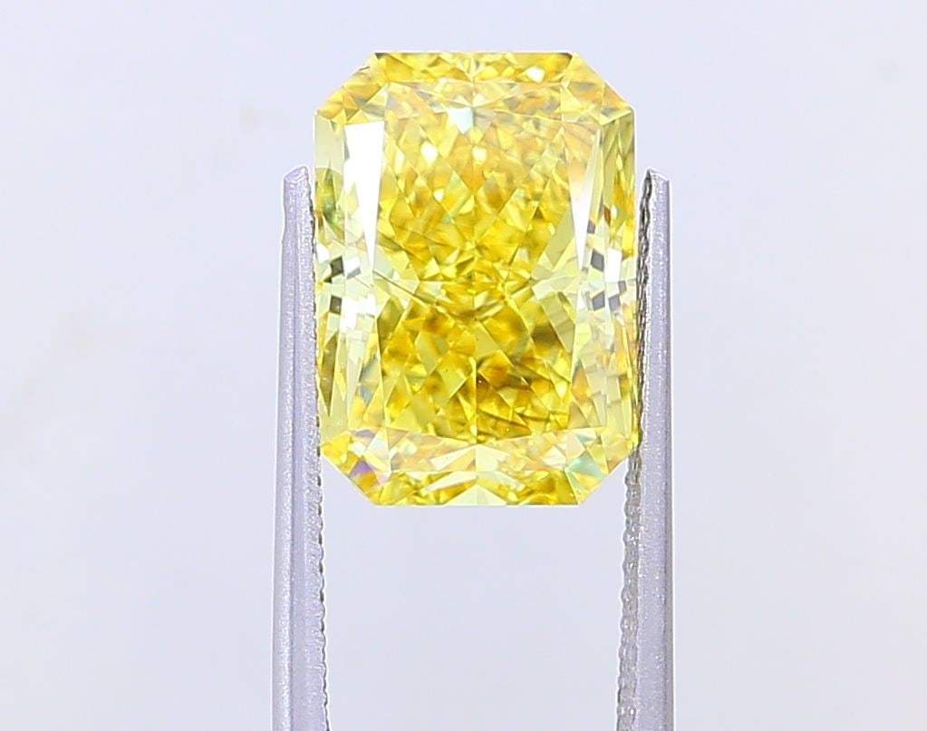 Loose Diamond - RADIANT 7.03ct Fancy Vivid Yellow SI1: Loose Diamond - RADIANT 7.03ct Fancy Vivid Yellow SI1 Source: This is a real non-mined Diamond that has been grown in a lab Shape: RADIANT Carats: 7.03 Color: Fancy Vivid Yellow Certification: IGI Vid