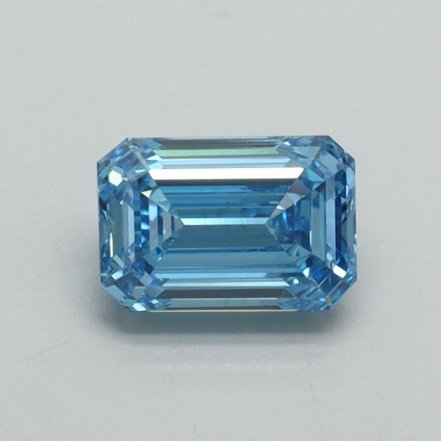 Loose Diamond - EMERALD 1.03ct Fancy Vivid Blue VS2: Loose Diamond - EMERALD 1.03ct Fancy Vivid Blue VS2 Source: This is a real non-mined Diamond that has been grown in a lab Shape: EMERALD Carats: 1.03 Color: Fancy Vivid Blue Certification: IGI Video: