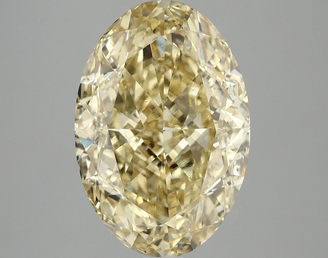 Loose Diamond - OVAL 5.1ct Fancy Vivid Yellow VS1: Loose Diamond - OVAL 5.1ct Fancy Vivid Yellow VS1 Source: This is a real non-mined Diamond that has been grown in a lab Shape: OVAL Carats: 5.1 Color: Fancy Vivid Yellow Certification: IGI Video: