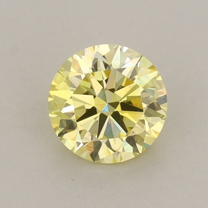 Loose Diamond - ROUND 0.68ct Fancy Yellow VVS2: Loose Diamond - ROUND 0.68ct Fancy Yellow VVS2 Source: This is a real non-mined Diamond that has been grown in a lab Shape: ROUND Carats: 0.68 Color: Fancy Yellow Certification: IGI Video: