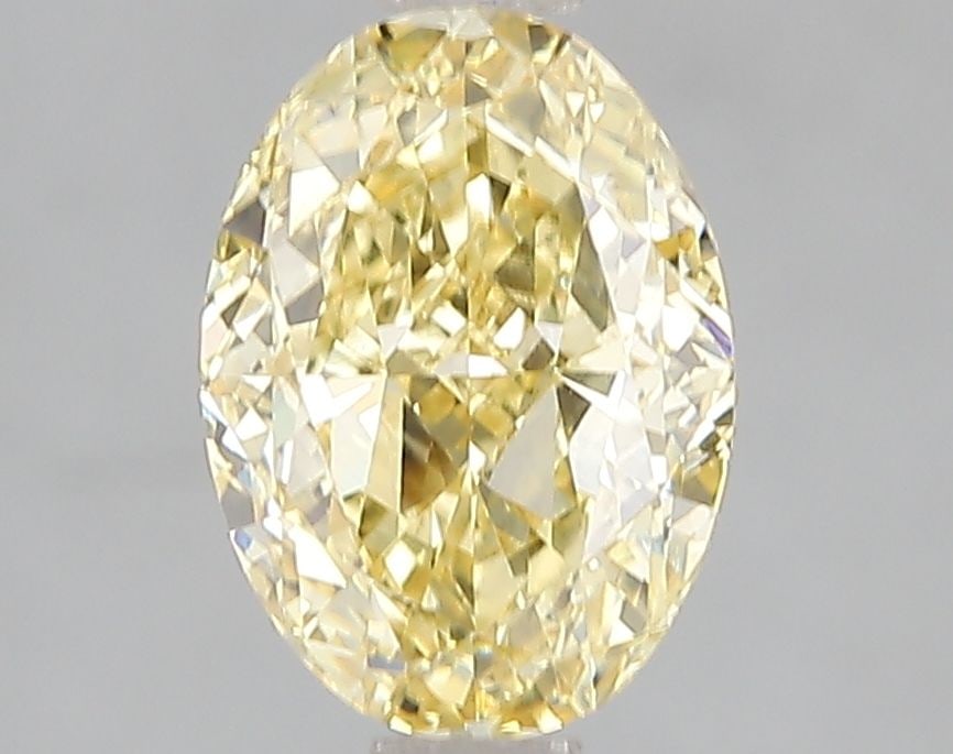 Loose Diamond - OVAL 2.08ct Fancy Vivid Yellow VS1: Loose Diamond - OVAL 2.08ct Fancy Vivid Yellow VS1 Source: This is a real non-mined Diamond that has been grown in a lab Shape: OVAL Carats: 2.08 Color: Fancy Vivid Yellow Certification: IGI Video: