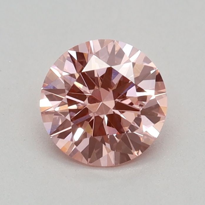 Loose Diamond - ROUND 0.35ct Fancy Vivid Pink VS1: Loose Diamond - ROUND 0.35ct Fancy Vivid Pink VS1 Source: This is a real non-mined Diamond that has been grown in a lab Shape: ROUND Carats: 0.35 Color: Fancy Vivid Pink Certification: IGI Video: