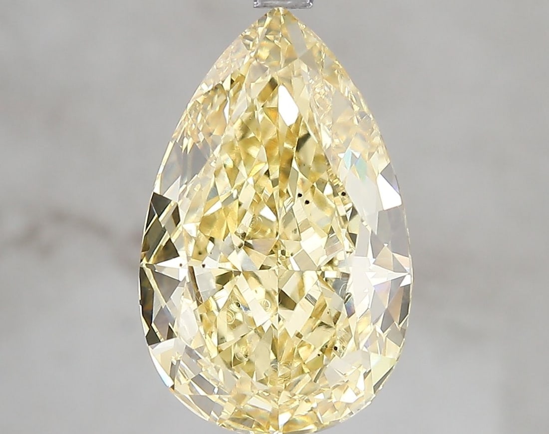 Loose Diamond - PEAR 5.01ct Fancy Vivid Yellow SI1: Loose Diamond - PEAR 5.01ct Fancy Vivid Yellow SI1 Source: This is a real non-mined Diamond that has been grown in a lab Shape: PEAR Carats: 5.01 Color: Fancy Vivid Yellow Certification: IGI Video: