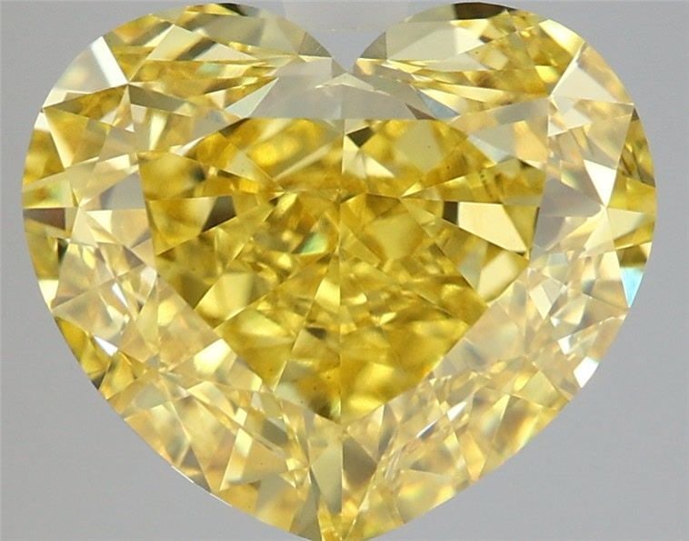 Loose Diamond - HEART 7.47ct Fancy Vivid Yellow VVS2: Loose Diamond - HEART 7.47ct Fancy Vivid Yellow VVS2 Source: This is a real non-mined Diamond that has been grown in a lab Shape: HEART Carats: 7.47 Color: Fancy Vivid Yellow Certification: IGI Video: