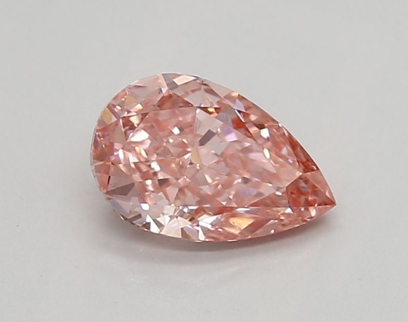 Loose Diamond - PEAR 0.88ct Fancy Vivid Pink VS1: Loose Diamond - PEAR 0.88ct Fancy Vivid Pink VS1 Source: This is a real non-mined Diamond that has been grown in a lab Shape: PEAR Carats: 0.88 Color: Fancy Vivid Pink Certification: IGI Video: