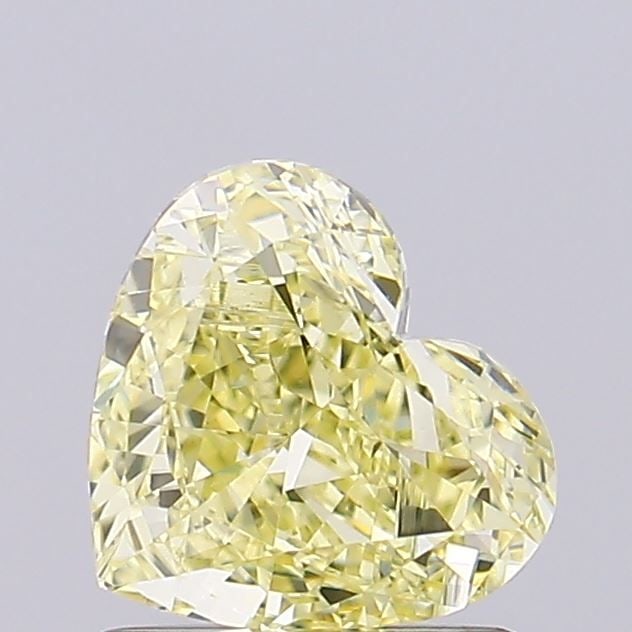 Loose Diamond - HEART 0.94ct Fancy Intense Yellow VS1: Loose Diamond - HEART 0.94ct Fancy Intense Yellow VS1 Source: This is a real non-mined Diamond that has been grown in a lab Shape: HEART Carats: 0.94 Color: Fancy Intense Yellow Certification: IGI Vid