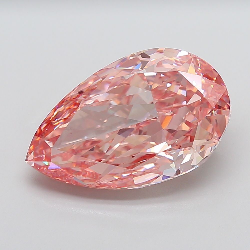 Loose Diamond - PEAR 12.39ct Fancy Vivid Pink VS1: Loose Diamond - PEAR 12.39ct Fancy Vivid Pink VS1 Source: This is a real non-mined Diamond that has been grown in a lab Shape: PEAR Carats: 12.39 Color: Fancy Vivid Pink Certification: IGI Video: