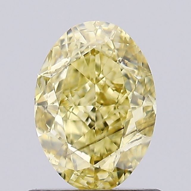Loose Diamond - OVAL 0.89ct Fancy Intense Yellow SI1: Loose Diamond - OVAL 0.89ct Fancy Intense Yellow SI1 Source: This is a real non-mined Diamond that has been grown in a lab Shape: OVAL Carats: 0.89 Color: Fancy Intense Yellow Certification: IGI Video