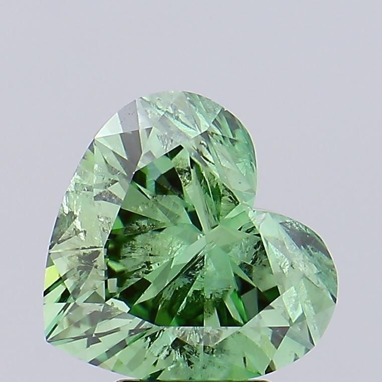 Loose Diamond - HEART 3.32ct Fancy Vivid Green I1: Loose Diamond - HEART 3.32ct Fancy Vivid Green I1 Source: This is a real non-mined Diamond that has been grown in a lab Shape: HEART Carats: 3.32 Color: Fancy Vivid Green Certification: IGI Video: