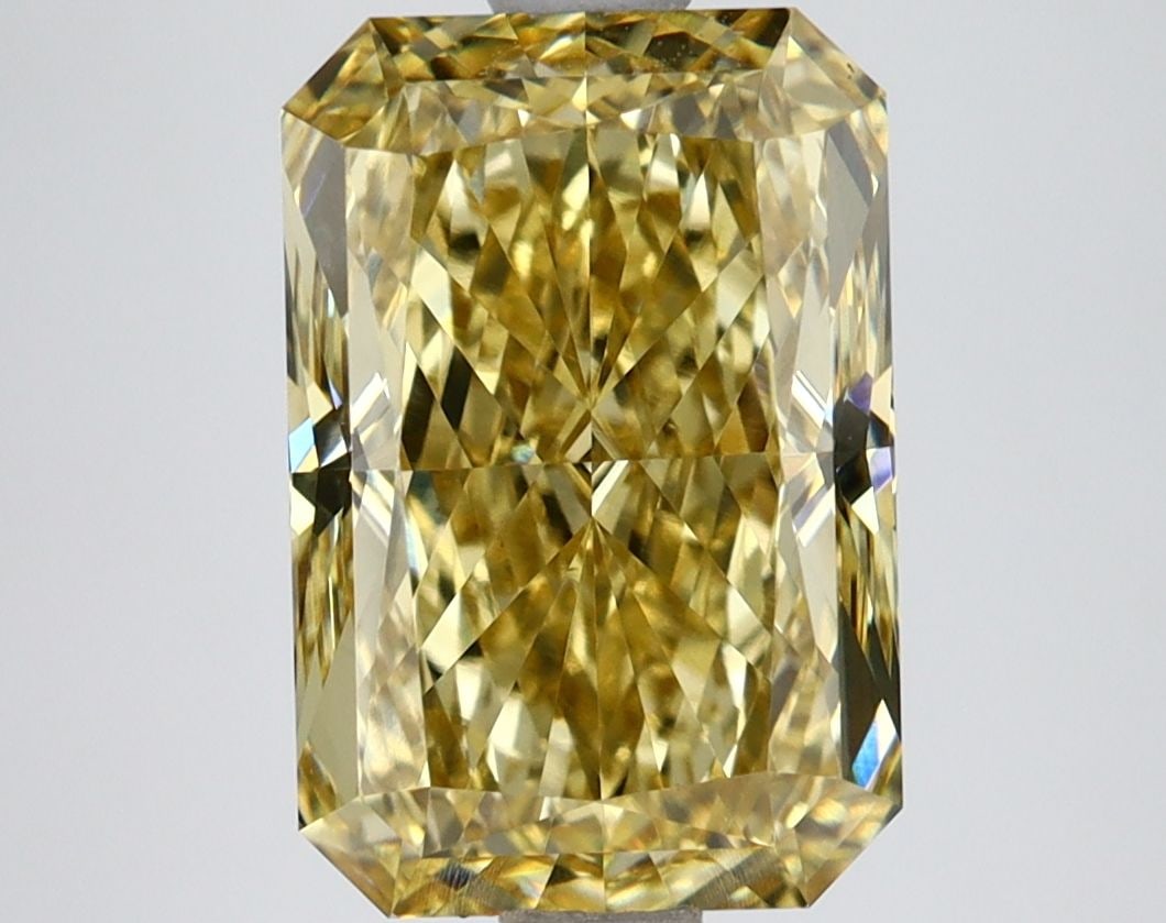 Loose Diamond - RADIANT 4.08ct Fancy Vivid Yellow VS1: Loose Diamond - RADIANT 4.08ct Fancy Vivid Yellow VS1 Source: This is a real non-mined Diamond that has been grown in a lab Shape: RADIANT Carats: 4.08 Color: Fancy Vivid Yellow Certification: IGI Vid