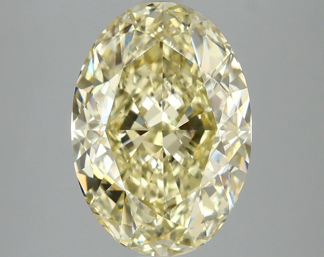 Loose Diamond - OVAL 5.09ct Fancy Intense Yellow VS2: Loose Diamond - OVAL 5.09ct Fancy Intense Yellow VS2 Source: This is a real non-mined Diamond that has been grown in a lab Shape: OVAL Carats: 5.09 Color: Fancy Intense Yellow Certification: IGI Video