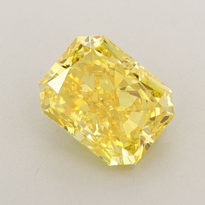 Loose Diamond - RADIANT 0.82ct Fancy Vivid Yellow VVS2: Loose Diamond - RADIANT 0.82ct Fancy Vivid Yellow VVS2 Source: This is a real non-mined Diamond that has been grown in a lab Shape: RADIANT Carats: 0.82 Color: Fancy Vivid Yellow Certification: IGI Vi