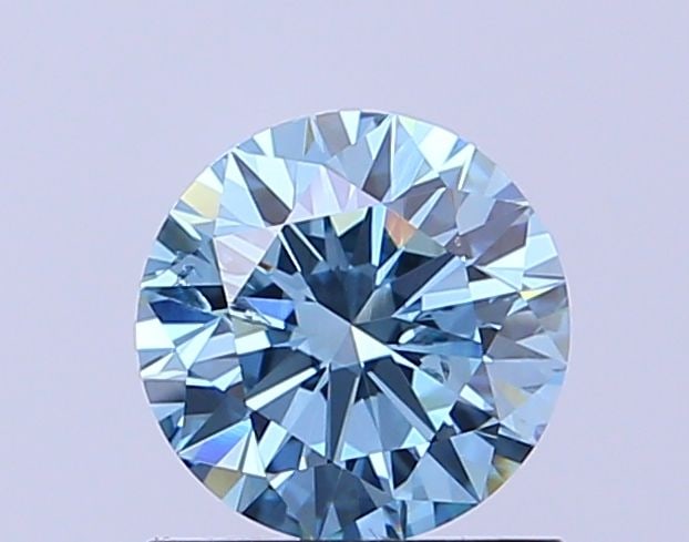 Ideal Loose Diamond - ROUND 0.96ct Fancy Vivid Blue SI2: Ideal Loose Diamond - ROUND 0.96ct Fancy Vivid Blue SI2 Source: This is a real non-mined Diamond that has been grown in a lab Shape: ROUND Carats: 0.96 Color: Fancy Vivid Blue Certification: IGI