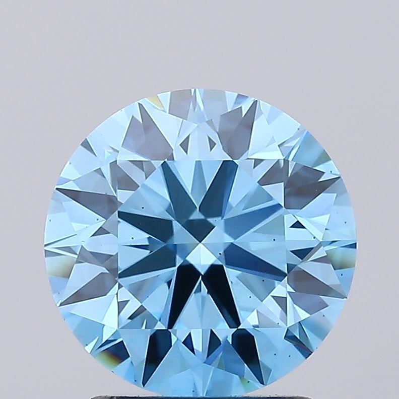 Ideal Loose Diamond - ROUND 2.26ct Fancy Vivid Blue VS1: Ideal Loose Diamond - ROUND 2.26ct Fancy Vivid Blue VS1 Source: This is a real non-mined Diamond that has been grown in a lab Shape: ROUND Carats: 2.26 Color: Fancy Vivid Blue Certification: IGI
