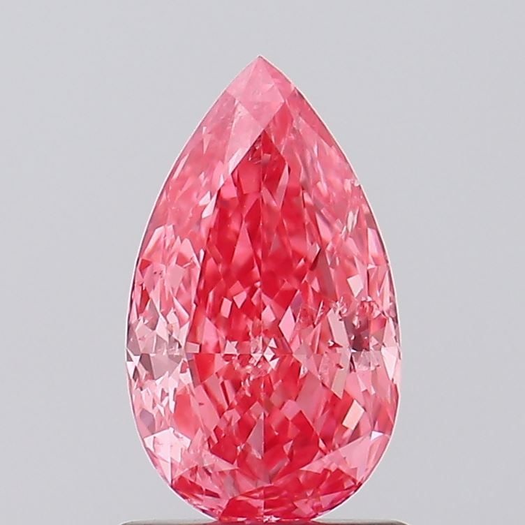 Loose Diamond - PEAR 1.02ct Fancy Vivid Pink SI2: Loose Diamond - PEAR 1.02ct Fancy Vivid Pink SI2 Source: This is a real non-mined Diamond that has been grown in a lab Shape: PEAR Carats: 1.02 Color: Fancy Vivid Pink Certification: IGI Video: