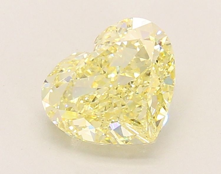 Loose Diamond - HEART 1.64ct Fancy Yellow VVS2: Loose Diamond - HEART 1.64ct Fancy Yellow VVS2 Source: This is a real non-mined Diamond that has been grown in a lab Shape: HEART Carats: 1.64 Color: Fancy Yellow Certification: IGI Video:
