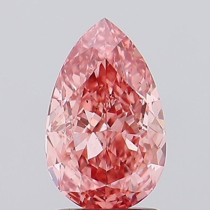Loose Diamond - PEAR 2.09ct Fancy Vivid Pink SI1: Loose Diamond - PEAR 2.09ct Fancy Vivid Pink SI1 Source: This is a real non-mined Diamond that has been grown in a lab Shape: PEAR Carats: 2.09 Color: Fancy Vivid Pink Certification: IGI Video: