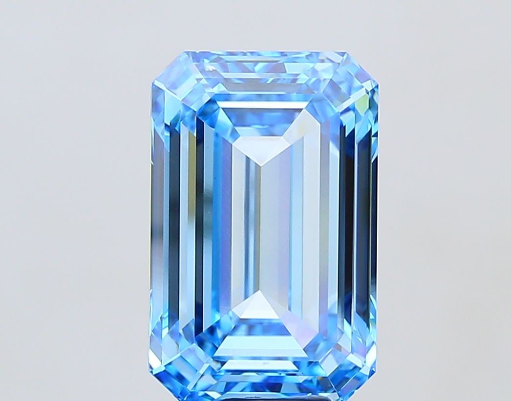 Loose Diamond - EMERALD 15.06ct Fancy Vivid Blue VS1: Loose Diamond - EMERALD 15.06ct Fancy Vivid Blue VS1 Source: This is a real non-mined Diamond that has been grown in a lab Shape: EMERALD Carats: 15.06 Color: Fancy Vivid Blue Certification: IGI