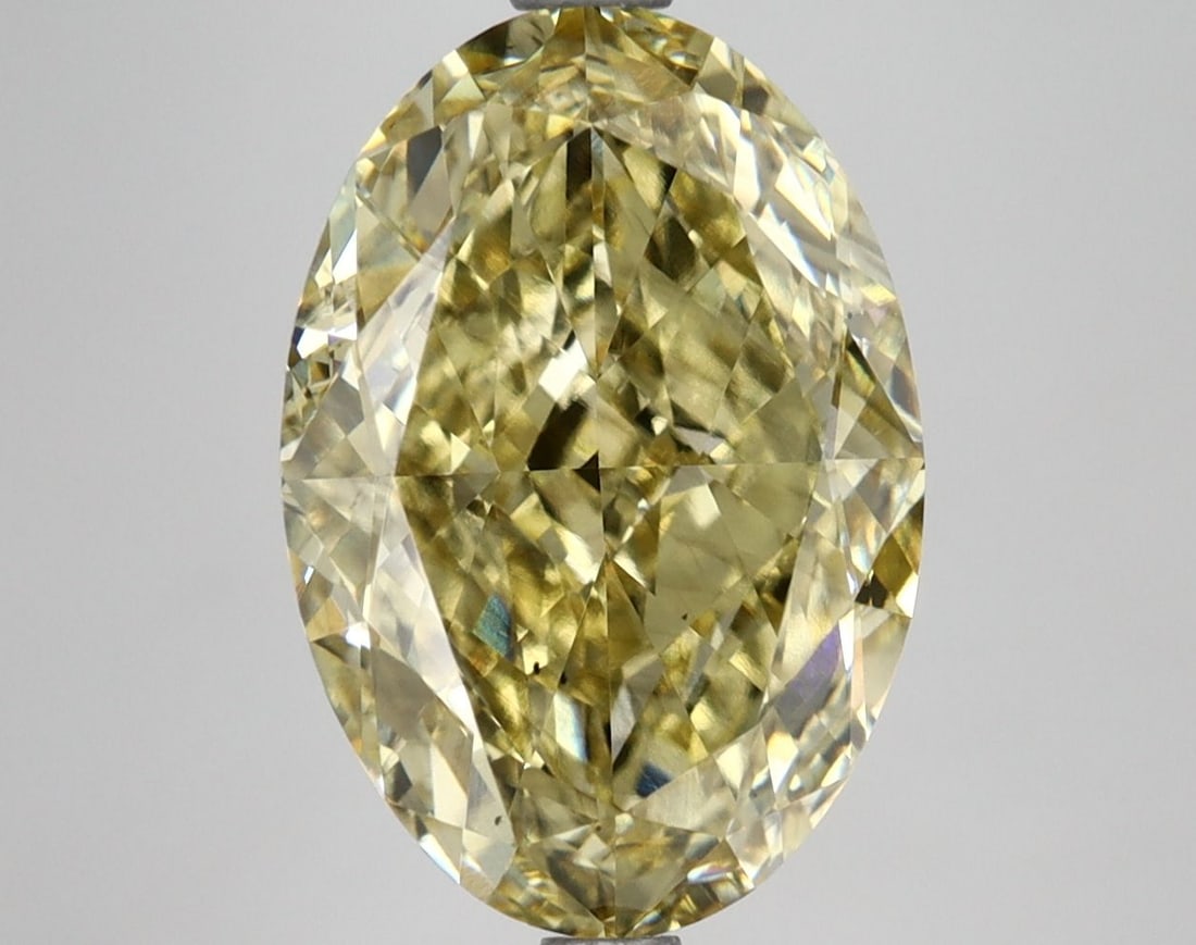 Loose Diamond - OVAL 5.51ct Fancy Vivid Yellow VS2: Loose Diamond - OVAL 5.51ct Fancy Vivid Yellow VS2 Source: This is a real non-mined Diamond that has been grown in a lab Shape: OVAL Carats: 5.51 Color: Fancy Vivid Yellow Certification: IGI Video:
