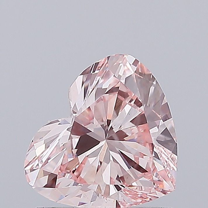 Loose Diamond - HEART 1.01ct Fancy Intense Pink VS1: Loose Diamond - HEART 1.01ct Fancy Intense Pink VS1 Source: This is a real non-mined Diamond that has been grown in a lab Shape: HEART Carats: 1.01 Color: Fancy Intense Pink Certification: IGI Video: