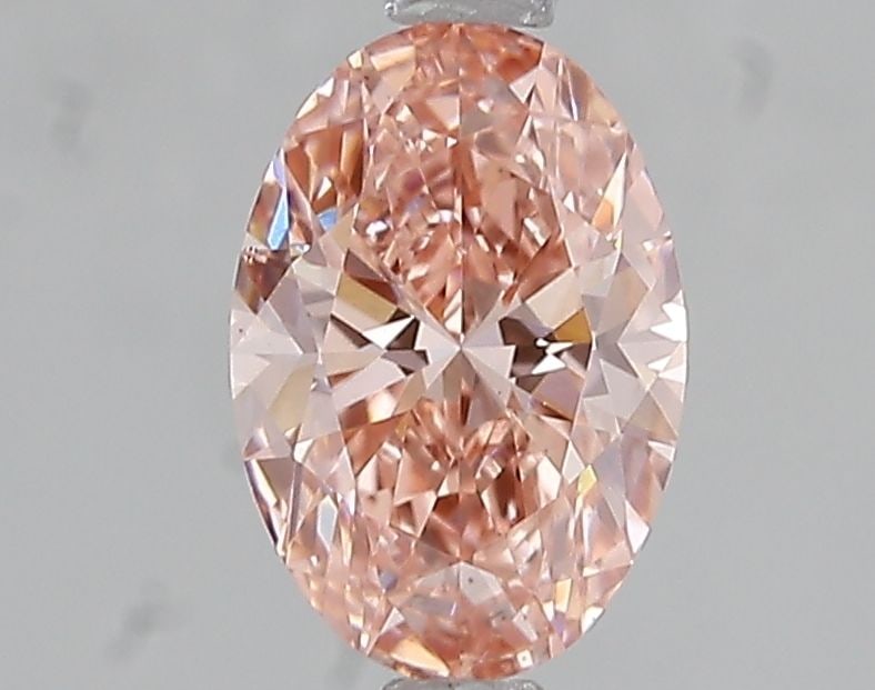 Loose Diamond - OVAL 1.2ct Fancy Vivid Pink VS1: Loose Diamond - OVAL 1.2ct Fancy Vivid Pink VS1 Source: This is a real non-mined Diamond that has been grown in a lab Shape: OVAL Carats: 1.2 Color: Fancy Vivid Pink Certification: IGI Video: