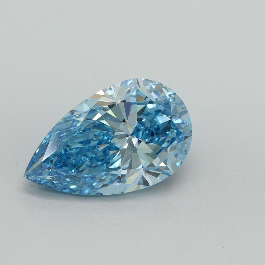 Loose Diamond - PEAR 2.01ct Fancy Vivid Blue VS1: Loose Diamond - PEAR 2.01ct Fancy Vivid Blue VS1 Source: This is a real non-mined Diamond that has been grown in a lab Shape: PEAR Carats: 2.01 Color: Fancy Vivid Blue Certification: IGI Video: