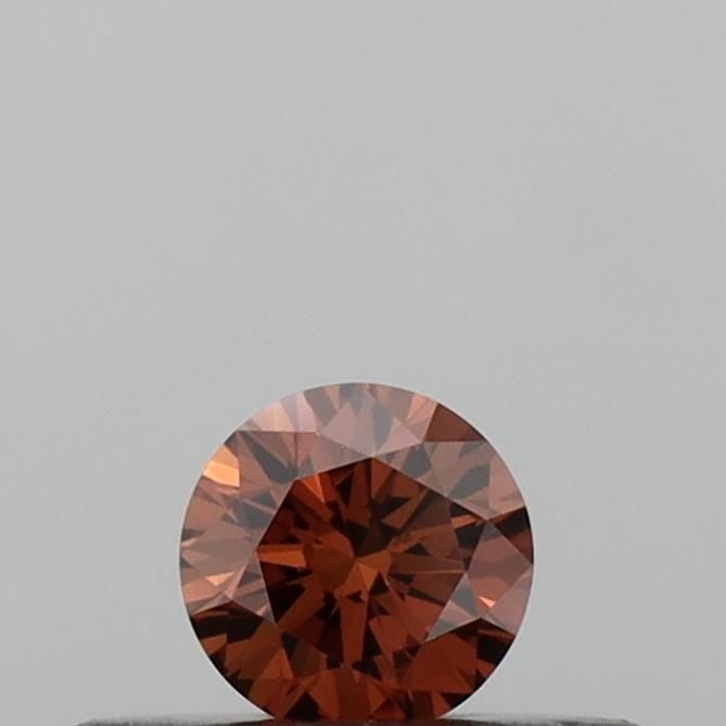 Loose Diamond - ROUND 0.17ct Fancy Vivid Orange VVS2: Loose Diamond - ROUND 0.17ct Fancy Vivid Orange VVS2 Source: This is a real non-mined Diamond that has been grown in a lab Shape: ROUND Carats: 0.17 Color: Fancy Vivid Orange Certification: IGI Video: