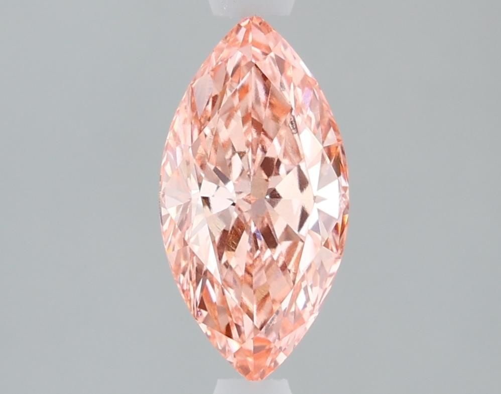 Loose Diamond - MARQUISE 1.34ct Fancy Vivid Pink VVS2: Loose Diamond - MARQUISE 1.34ct Fancy Vivid Pink VVS2 Source: This is a real non-mined Diamond that has been grown in a lab Shape: MARQUISE Carats: 1.34 Color: Fancy Vivid Pink Certification: IGI Vide