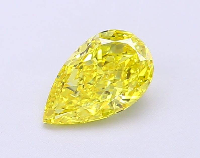 Loose Diamond - PEAR 1.03ct Fancy Vivid Yellow VS1: Loose Diamond - PEAR 1.03ct Fancy Vivid Yellow VS1 Source: This is a real non-mined Diamond that has been grown in a lab Shape: PEAR Carats: 1.03 Color: Fancy Vivid Yellow Certification: IGI Video: