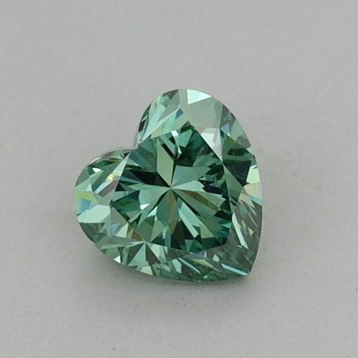 Loose Diamond - HEART 0.54ct Fancy Vivid Green VS1: Loose Diamond - HEART 0.54ct Fancy Vivid Green VS1 Source: This is a real non-mined Diamond that has been grown in a lab Shape: HEART Carats: 0.54 Color: Fancy Vivid Green Certification: IGI Video: