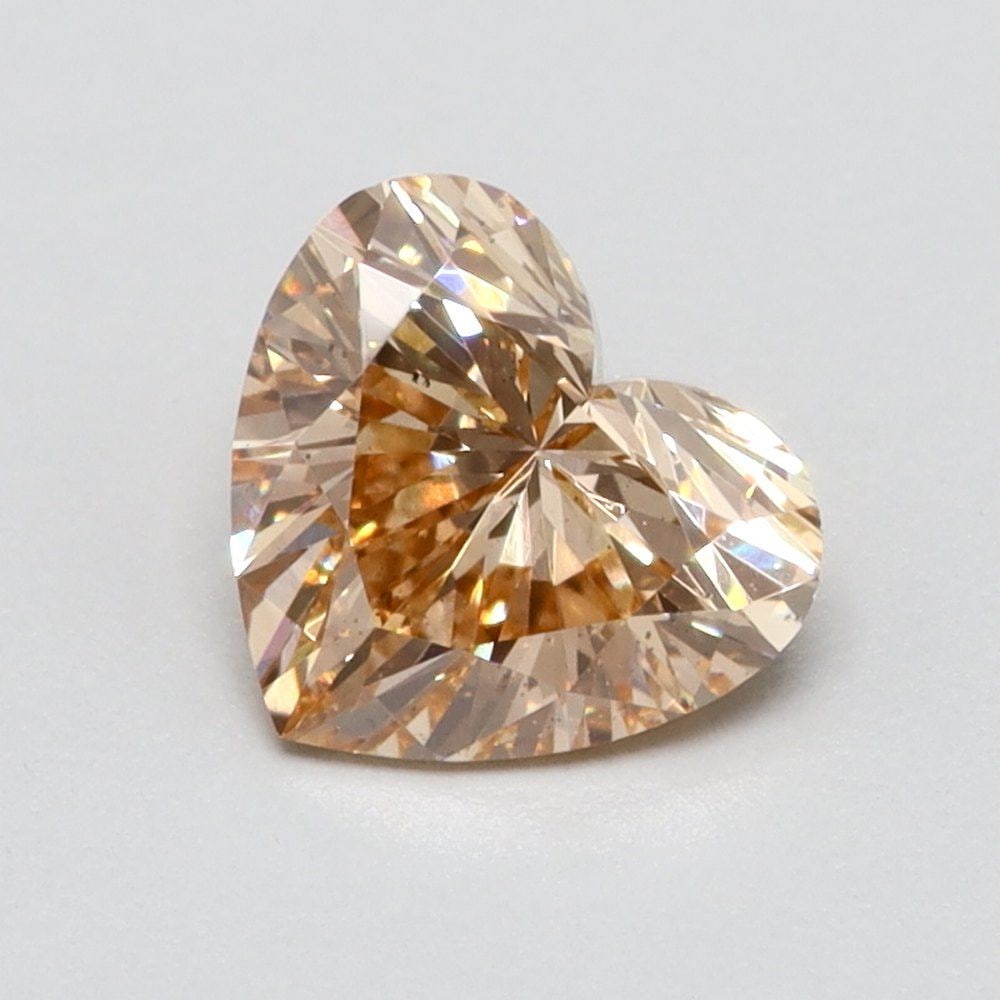 Loose Diamond - HEART 0.4ct Fancy Intense Pink VS2: Loose Diamond - HEART 0.4ct Fancy Intense Pink VS2 Source: This is a real non-mined Diamond that has been grown in a lab Shape: HEART Carats: 0.4 Color: Fancy Intense Pink Certification: NONE Video: