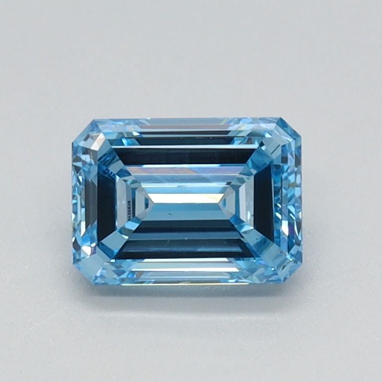 Loose Diamond - EMERALD 0.67ct Fancy Vivid Blue VS1: Loose Diamond - EMERALD 0.67ct Fancy Vivid Blue VS1 Source: This is a real non-mined Diamond that has been grown in a lab Shape: EMERALD Carats: 0.67 Color: Fancy Vivid Blue Certification: IGI Video: