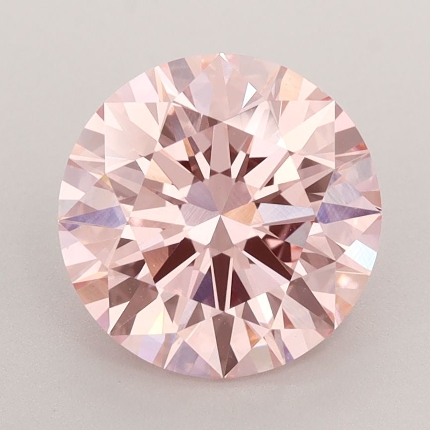 Ideal Loose Diamond - ROUND 2.65ct Fancy Vivid Pink VS1: Ideal Loose Diamond - ROUND 2.65ct Fancy Vivid Pink VS1 Source: This is a real non-mined Diamond that has been grown in a lab Shape: ROUND Carats: 2.65 Color: Fancy Vivid Pink Certification: IGI Video