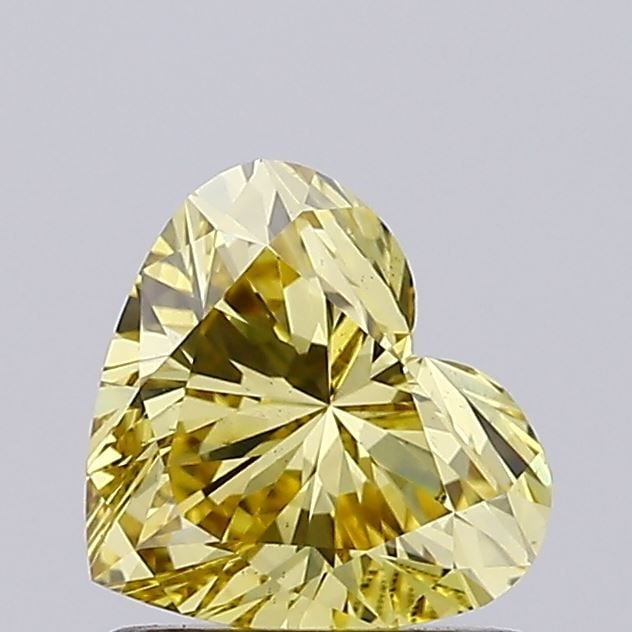 Loose Diamond - HEART 1.02ct Fancy Yellow VS2: Loose Diamond - HEART 1.02ct Fancy Yellow VS2 Source: This is a real non-mined Diamond that has been grown in a lab Shape: HEART Carats: 1.02 Color: Fancy Yellow Certification: IGI Video: